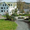 The historic Kenoza Hall is perched on a hillside, boasts lake-front views, and soon family-friendly bungalows. Photo by the author