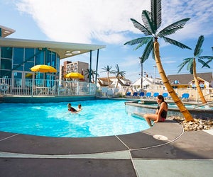 Take a dip in the pool at the Starlux, a family-friendly hotel in Wildwood, New Jersey. 